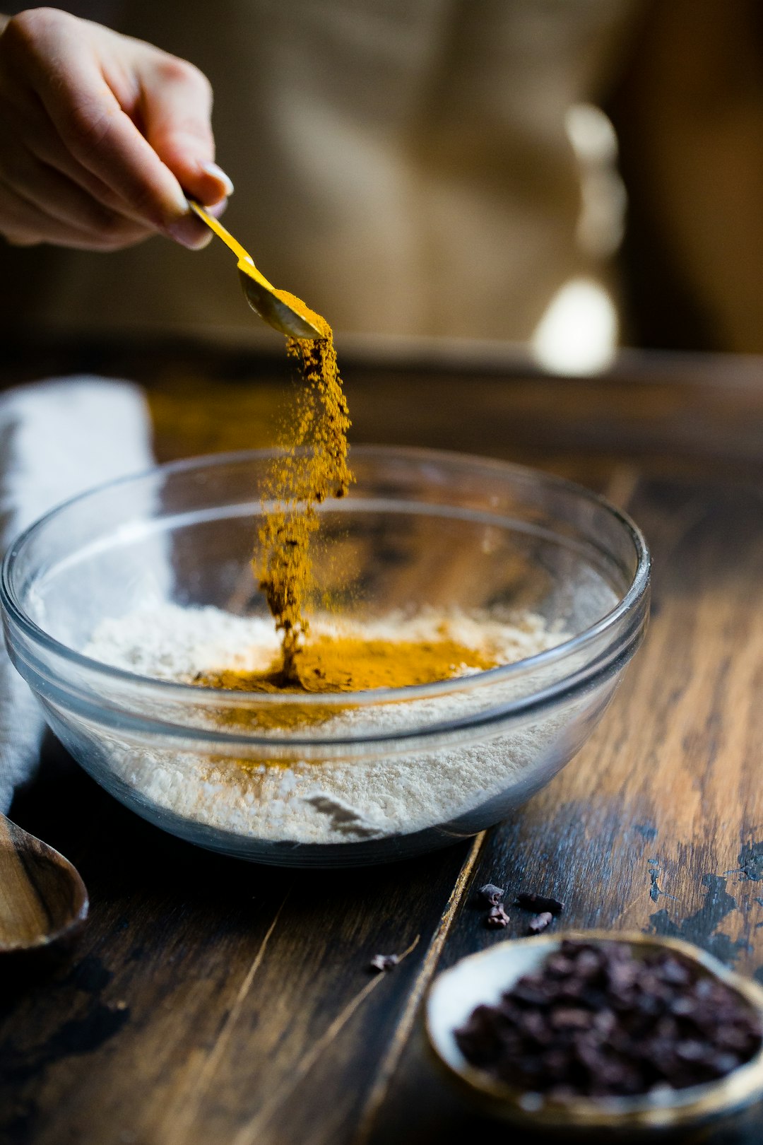 gallery-img-05 I took this photo with a small light source and a super fast shutter speed. I love this photo because it makes me feel happy. I love to bake, which is what’s obviously happening. Plus the bright turmeric is a happy color.